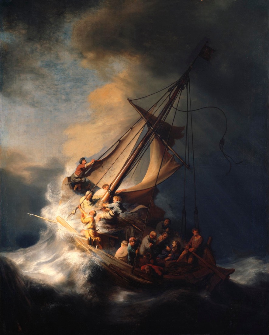 A small fishing boat with a torn sail heels over in a huge wave under dark storm clouds, its crew struggling with the rigging.